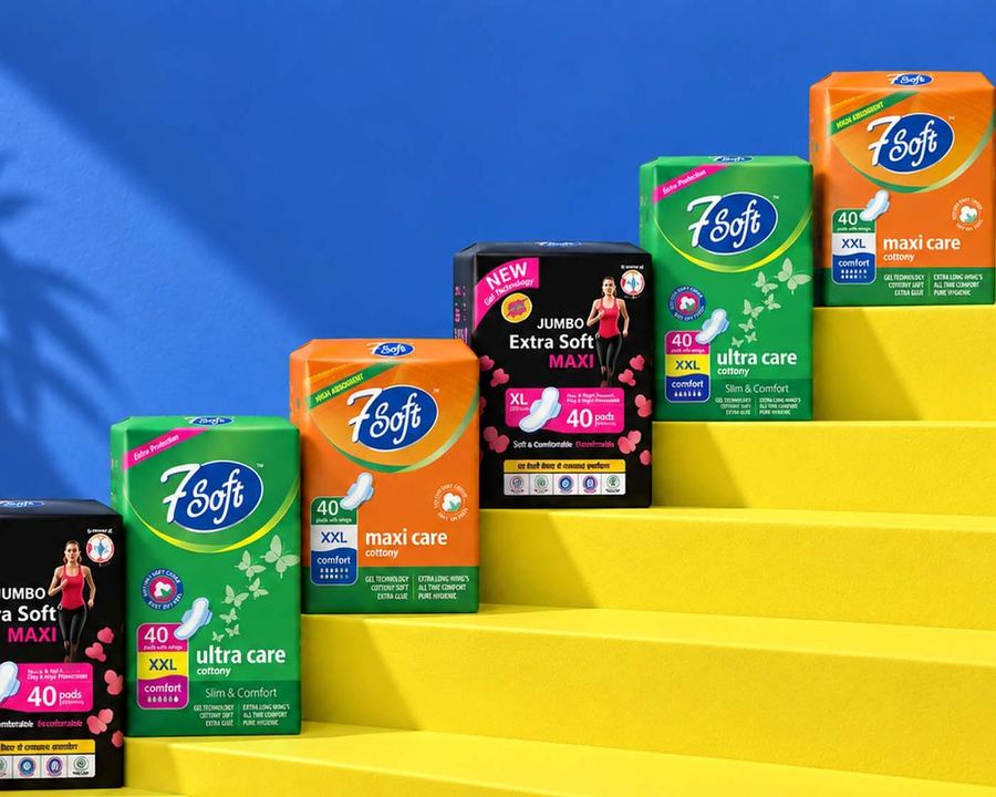 Product range styled on yellow steps for a launch campaign